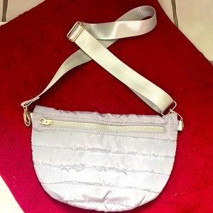 Small silver/grey boutique crossbody purse.